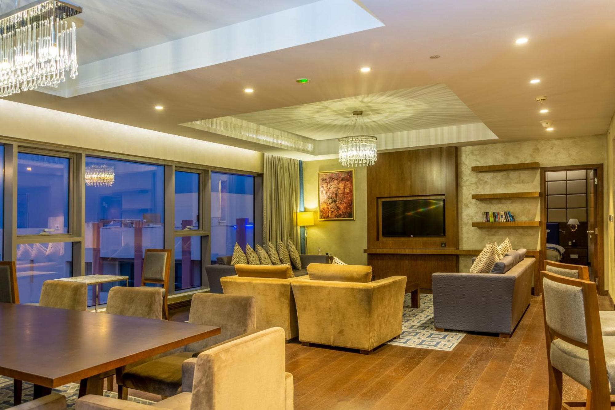 Radisson Blu Hotel & Resort, Sohar Exterior photo The lounge at Kilimanjaro International Airport