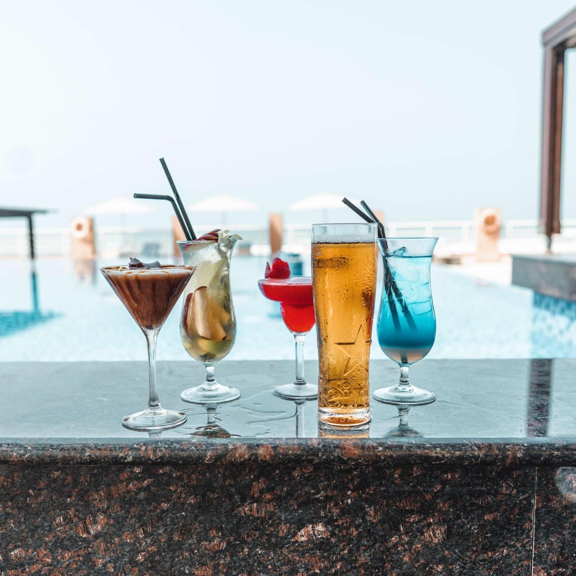 Radisson Blu Hotel & Resort, Sohar Exterior photo A selection of cocktails